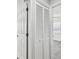 White louvered closet doors in hallway at 5061 Jasmine Cir, St Petersburg, FL 33714