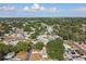 Aerial view of a single-Gathering home in a residential neighborhood with surrounding houses at 5061 Jasmine Cir, St Petersburg, FL 33714