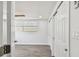 Spacious bedroom with ceiling fan, window, and double closets at 5061 Jasmine Cir, St Petersburg, FL 33714