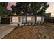 Newly renovated home with modern shutters and landscaping at 5061 Jasmine Cir, St Petersburg, FL 33714