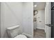 Updated bathroom with toilet and laundry hookups at 5061 Jasmine Cir, St Petersburg, FL 33714