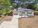 Cute house with new landscaping and driveway at 5061 Jasmine Cir, St Petersburg, FL 33714