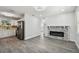 Open concept kitchen with white cabinets and stainless steel appliances at 5061 Jasmine Cir, St Petersburg, FL 33714