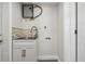 Clean laundry area with new sink and cabinets at 5061 Jasmine Cir, St Petersburg, FL 33714