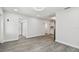 Open concept living area with wood-look floors at 5061 Jasmine Cir, St Petersburg, FL 33714