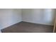 Empty bedroom with wood-look floors and neutral walls at 3706 W Wyoming Ave, Tampa, FL 33611