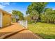 Large backyard with deck and lush landscaping at 803 Bayshore Blvd, Tampa, FL 33606