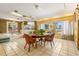 Spacious dining area with large windows and wood table at 803 Bayshore Blvd, Tampa, FL 33606