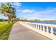 Scenic waterfront path with balustrade and city skyline view at 803 Bayshore Blvd, Tampa, FL 33606