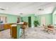 Basement kitchen with island, seating, and stainless steel appliances at 803 Bayshore Blvd, Tampa, FL 33606