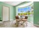 Bright dining area with window views and retro table and chairs at 803 Bayshore Blvd, Tampa, FL 33606