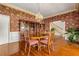 Elegant dining room features hardwood floors, a crystal chandelier, and built-in hutch at 803 Bayshore Blvd, Tampa, FL 33606