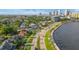 House by the water with city skyline in background at 803 Bayshore Blvd, Tampa, FL 33606