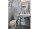 Small bathroom with pedestal sink and geometric tile at 803 Bayshore Blvd, Tampa, FL 33606