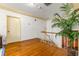 Spacious hallway with hardwood floors and elegant railing at 803 Bayshore Blvd, Tampa, FL 33606