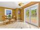 Cozy breakfast nook with glass table and French doors at 803 Bayshore Blvd, Tampa, FL 33606