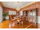 Bright dining room with hardwood floors, a chandelier, and built-in cabinetry at 803 Bayshore Blvd, Tampa, FL 33606