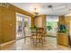 Bright breakfast nook with glass table and access to patio at 803 Bayshore Blvd, Tampa, FL 33606