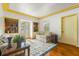 Cozy living room features hardwood floors, built-in shelves, and water views at 803 Bayshore Blvd, Tampa, FL 33606