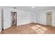 Bright bedroom with tile floors and access to other rooms at 1702 Blind Pond Ave, Lutz, FL 33549