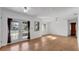 Bright dining room with tile floor and French doors at 1702 Blind Pond Ave, Lutz, FL 33549