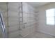 Large pantry with wire shelving for storage at 1702 Blind Pond Ave, Lutz, FL 33549