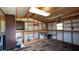 Workshop with cabinets, shelving, and workbench at 1702 Blind Pond Ave, Lutz, FL 33549