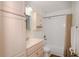 Bathroom features a bathtub, shower, and updated vanity at 1702 Blind Pond Ave, Lutz, FL 33549