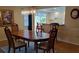 Dining room with wood table and kitchen access at 6263 Green View Cir # 107, Sarasota, FL 34231