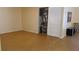 Simple living room with laminate flooring and storage at 6263 Green View Cir # 107, Sarasota, FL 34231