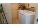 Clean laundry room with washer, dryer, and storage at 6263 Green View Cir # 107, Sarasota, FL 34231