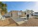 Backyard featuring a concrete patio with pergola, grill, gravel landscaping, and privacy fence at 186 45Th Ave, St Pete Beach, FL 33706