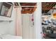 Bathroom featuring shower stall, sink and view into workshop area at 186 45Th Ave, St Pete Beach, FL 33706