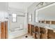 Partially renovated bathroom with a tiled shower/tub combination at 186 45Th Ave, St Pete Beach, FL 33706
