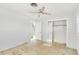 A bedroom with doors leading to the bathroom and closet at 186 45Th Ave, St Pete Beach, FL 33706