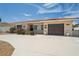 Lovely single-story home features a new terra cotta roof, long driveway, and decorative shutters at 186 45Th Ave, St Pete Beach, FL 33706