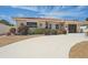 Charming single-story home featuring a terracotta roof and a spacious driveway with low maintenance landscaping at 186 45Th Ave, St Pete Beach, FL 33706