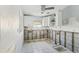 Kitchen with white cabinets, tile floor and open to the studs, ready for remodel at 186 45Th Ave, St Pete Beach, FL 33706