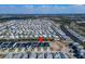 This community aerial view highlights the neighborhood layout and proximity to waterways at 6540 Simone Shores Cir, Apollo Beach, FL 33572