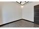 Clean and modern bedroom with an accent wall and a sleek door at 6540 Simone Shores Cir, Apollo Beach, FL 33572
