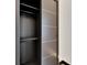 Modern closet design with sliding doors and ample storage, blending style and functionality at 6540 Simone Shores Cir, Apollo Beach, FL 33572