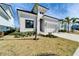 Charming two-story home featuring minimalist landscaping, and a two-car garage at 6540 Simone Shores Cir, Apollo Beach, FL 33572