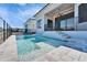 Beautiful backyard with a sparkling pool, perfect for entertaining and relaxing at 6540 Simone Shores Cir, Apollo Beach, FL 33572