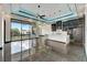 Modern kitchen with a large island and high-end appliances at 6540 Simone Shores Cir, Apollo Beach, FL 33572