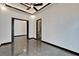 Spacious bedroom with marble floors and modern ceiling design at 6540 Simone Shores Cir, Apollo Beach, FL 33572