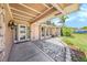 Inviting front entry with covered porch and landscaping at 2115 Seagull Dr, Clearwater, FL 33764