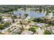 Aerial view of house and neighborhood, showcasing waterfront location and community at 2115 Seagull Dr, Clearwater, FL 33764