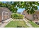 Tan shed with white trim and double doors at 2115 Seagull Dr, Clearwater, FL 33764