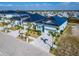 Residential neighborhood displaying attractive homes, mature palm trees, and manicured lawns at 6542 Simone Shores Cir, Apollo Beach, FL 33572