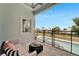 Covered patio seating area with a view of the swimming pool and surrounding canal at 6542 Simone Shores Cir, Apollo Beach, FL 33572
